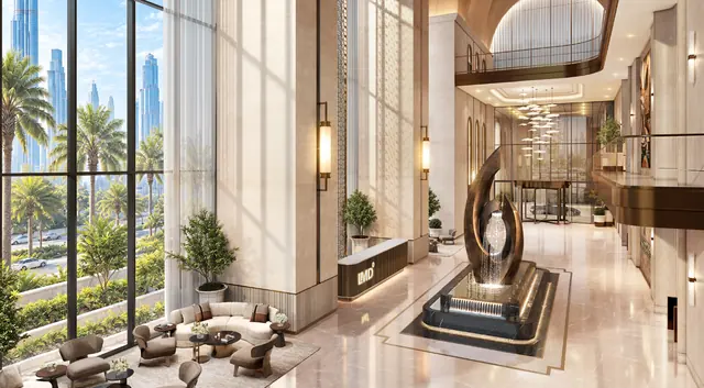 Lobby with sculpture and garden views